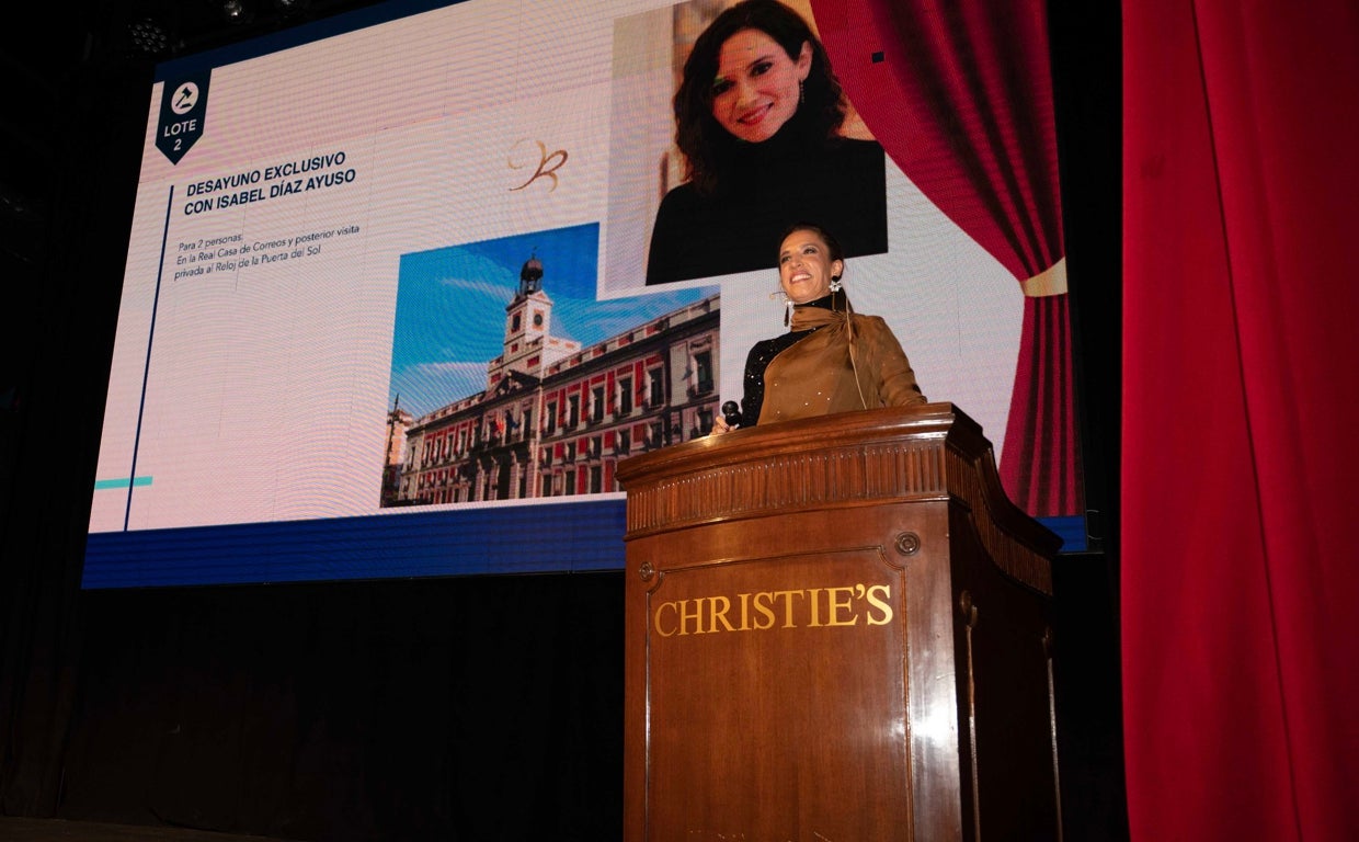 Imagen del momento en el que fue subastado el desayuno con la presidenta