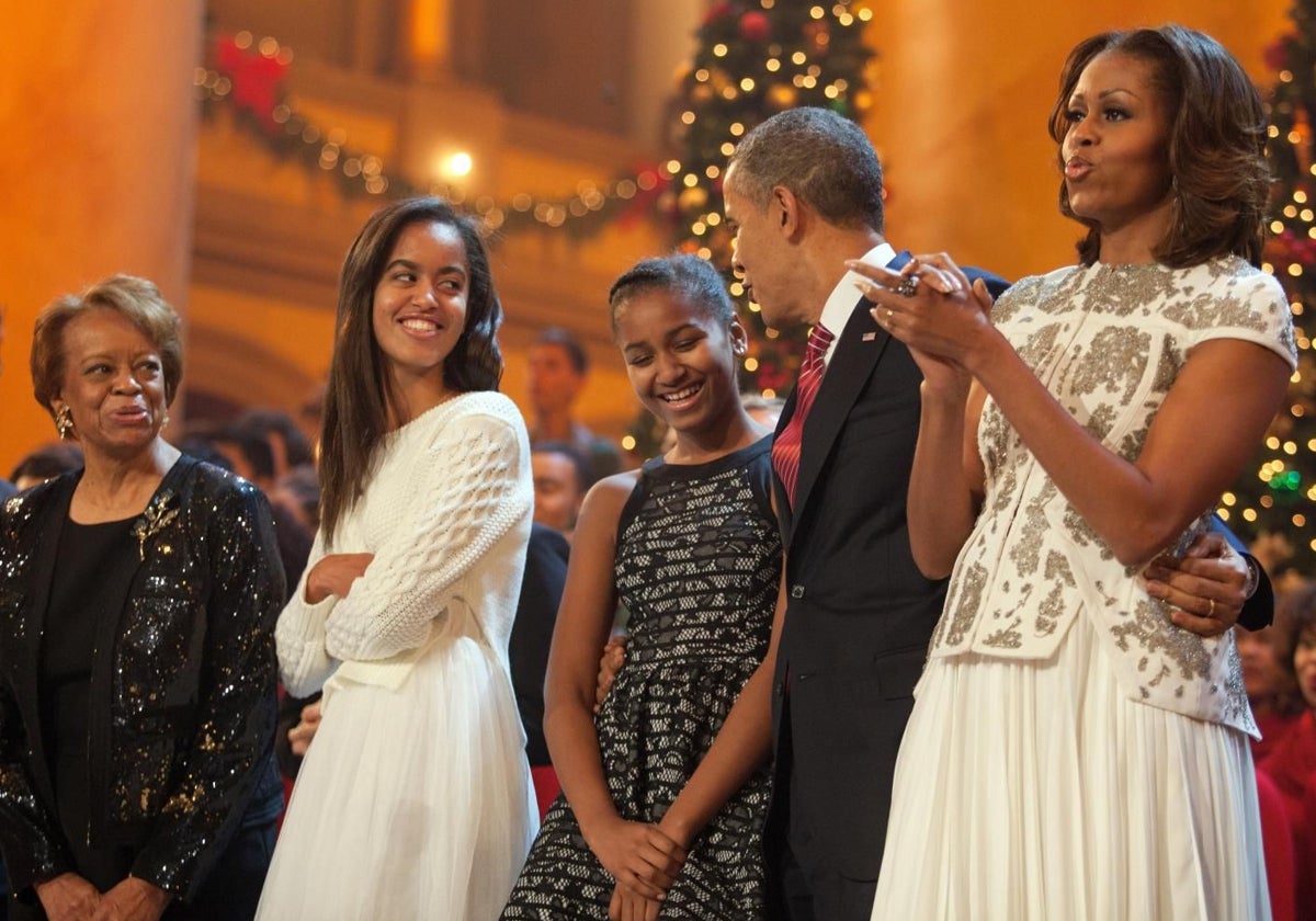 Marian, junto a la familia Obama, en un acto oficial en 2013