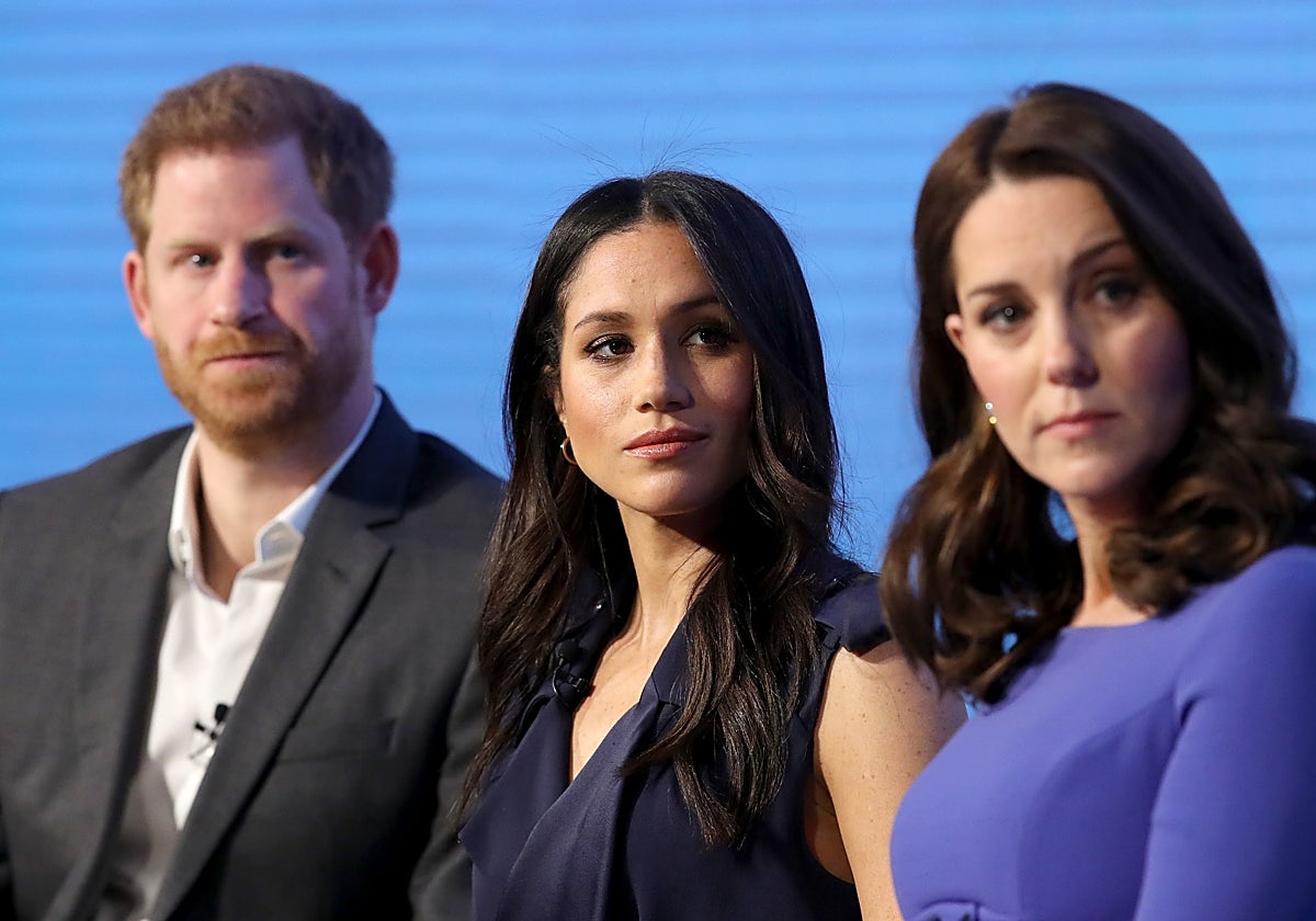 El Príncipe Harry, Meghan Markle y Kate Middleton, en una imagen de archivo.