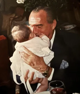 Secondary image 2 - Above, Iria Fernández-Tapias with her parents, Fernando Fernández-Tapias and Mercedes Cañizares. Left, the young woman with her father attending her grandfather's funeral. Right, a photo with the Galician businessman at his baptism