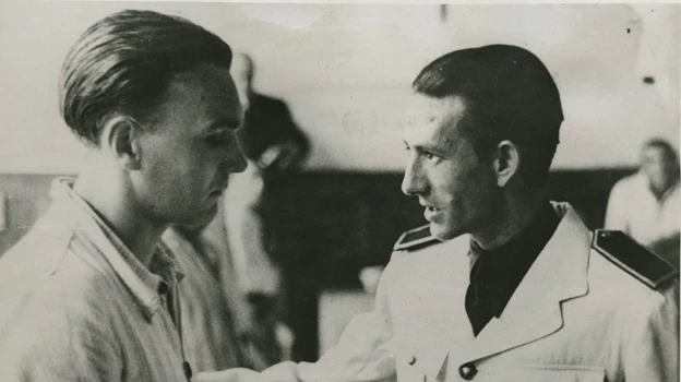 Ridruejo (right), visiting combatants from the Blue Division at the Mola Hospital in San Sebastián in 1942