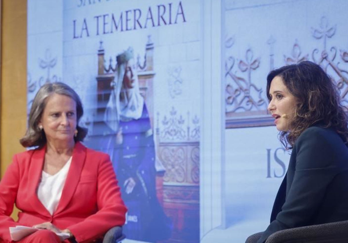 San Sebastián y Ayuso, durante el evento