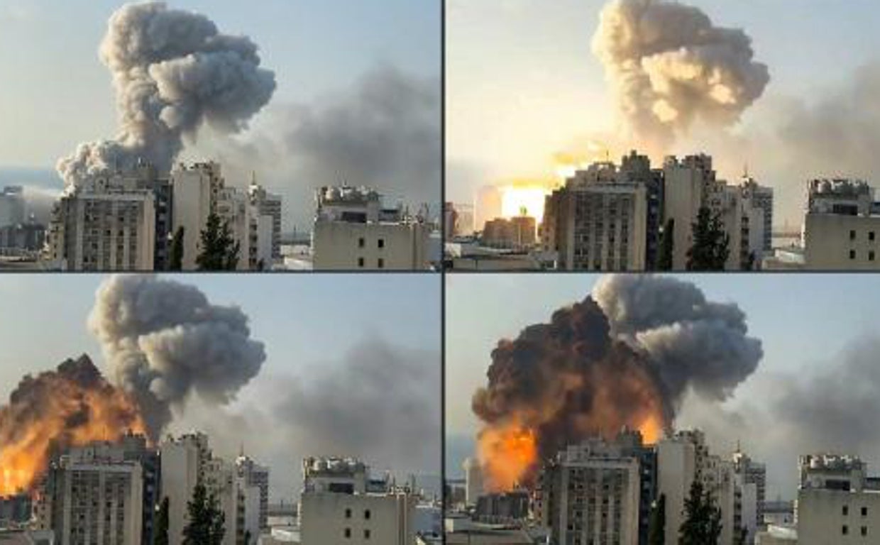 Combo de la bola de fuego que explota en el puerto mientras el humo se extiende por  la capital libanesa