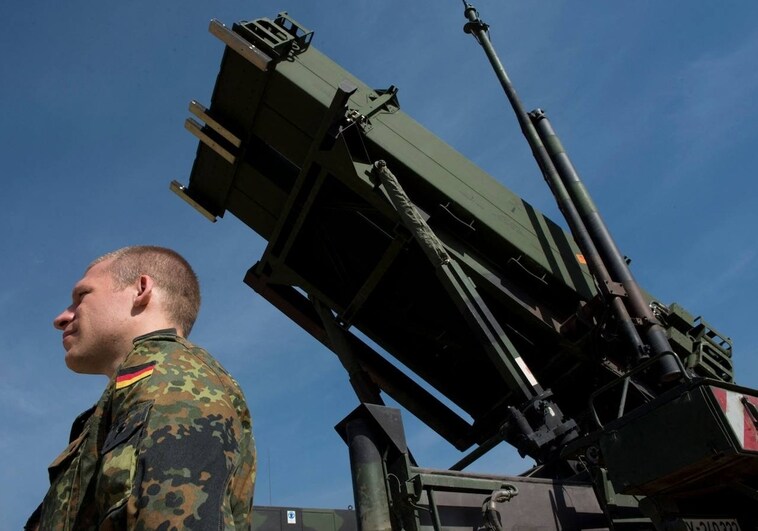 A German soldier in front of a Patriot missile launcher in Turkey