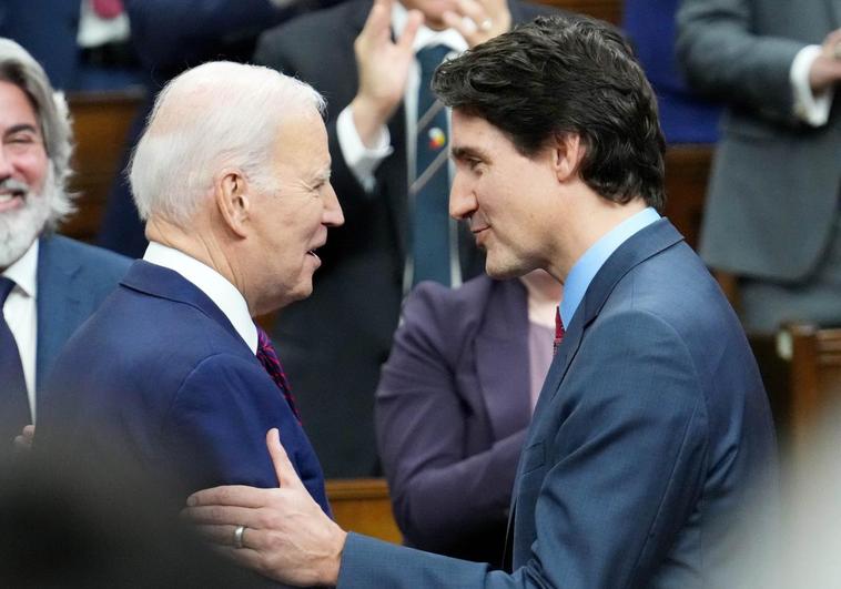 Canadian Prime Minister Justin Trudeau greets US President Joe Biden