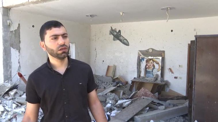 Dos artistas palestinos decoran las paredes y escombros de Gaza a modo de protesta