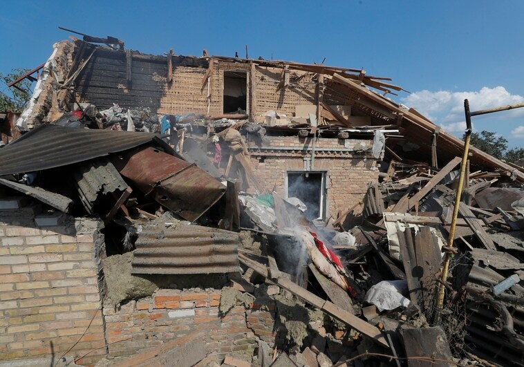A building destroyed by the remnants of a missile in the town of Stary Petrivtsi, near Kiev