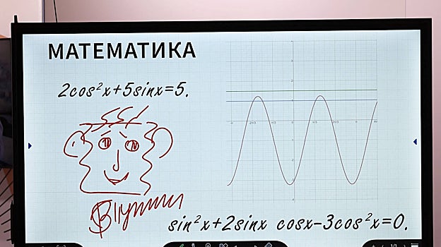 Caricatura hecha por Putin junto a su firma después de visitar un foro sobre el futuro en Moscúi