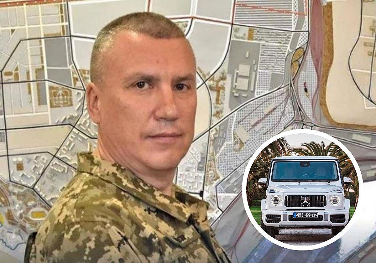 El coronel Yevguen Borísov y un coche Mercedes de gama alta