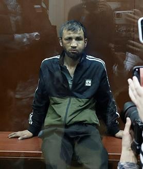 Imagen secundaria 2 - Los cuatro sospechosos de la masacre de Moscú comparecen ante la Justicia rusa con signos de violencia física