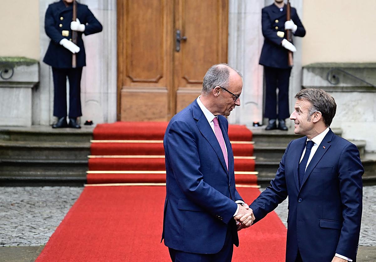 El canciller Merz, a la izquierda, ofreció anoche una cena de trabajo a Macron en Villa Borsig