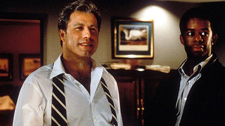 John Travolta en un fotograma de 'Primary Colours' de Mike Nichols