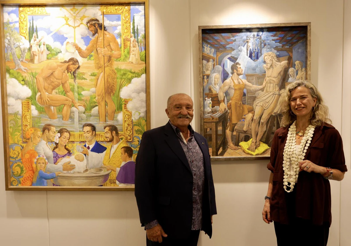 Juan Antonio Huguet Pretel y María Luisa García-Palacios Álvarez, ante varios cuadros del artista