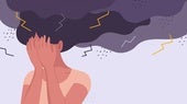 Una mujer con dolor de cabeza