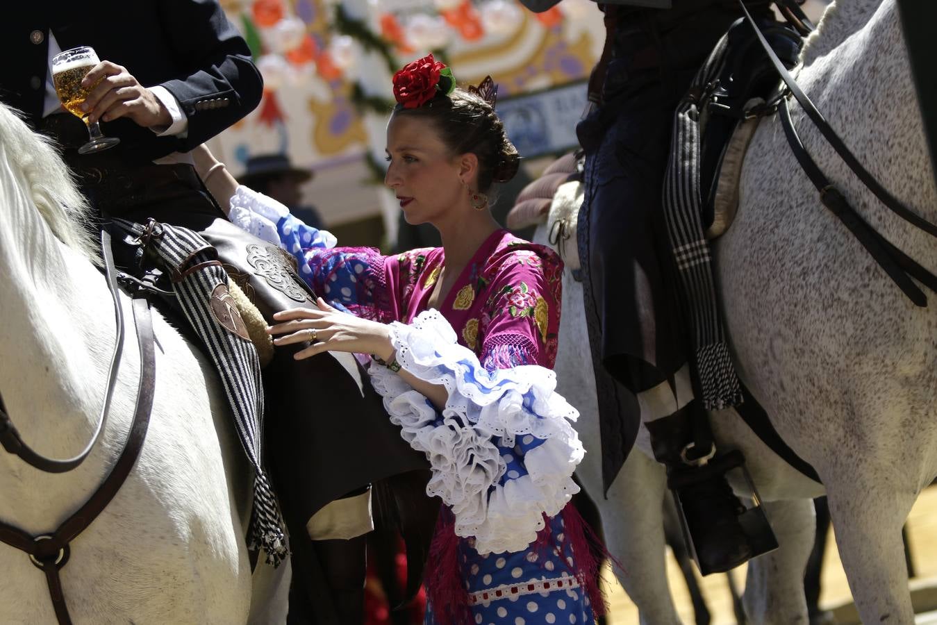 Calor y multitudes este lunes en el real de la Feria