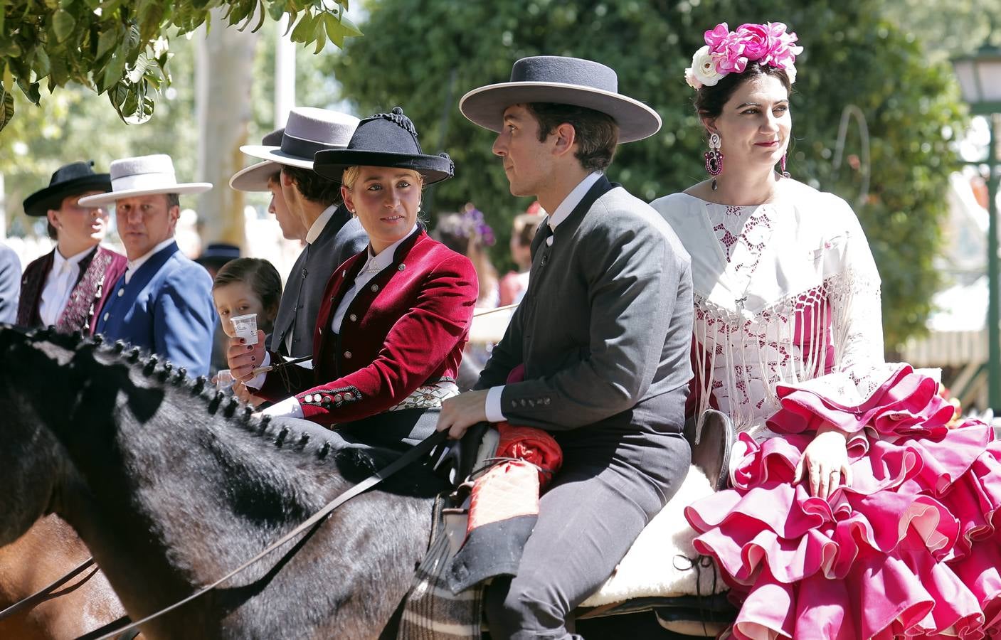 Calor y multitudes este lunes en el real de la Feria