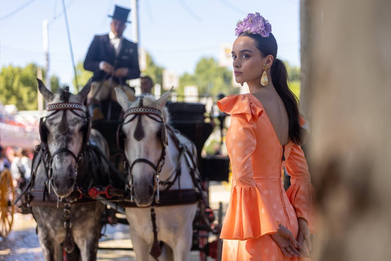 Calor y multitudes este lunes en el real de la Feria