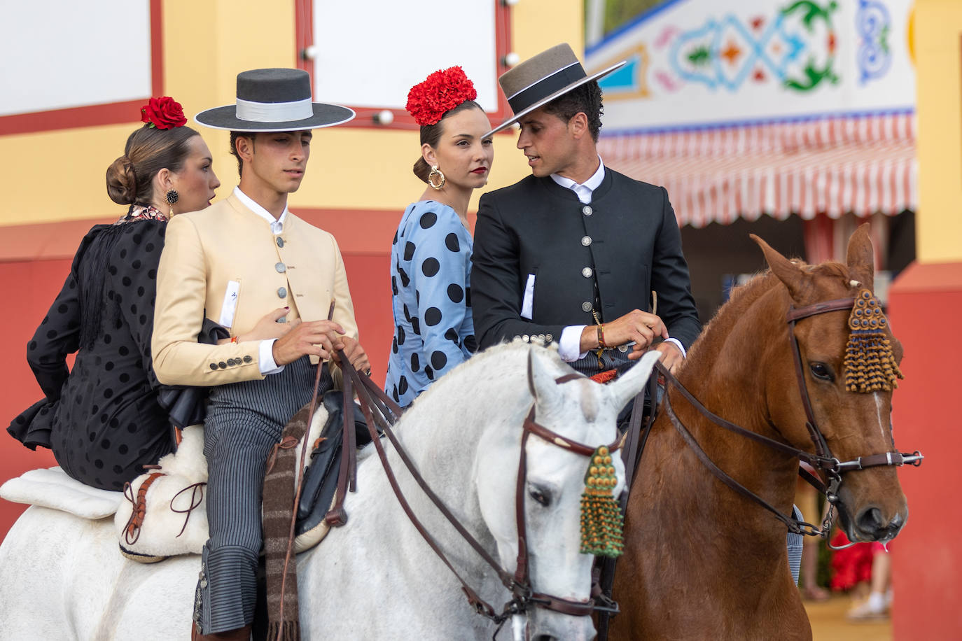 Ambiente en el Real de la Feria en este viernes pasado por agua