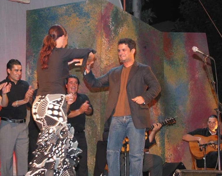 Encarni Fernández bailando junto a Alejandro Sanz