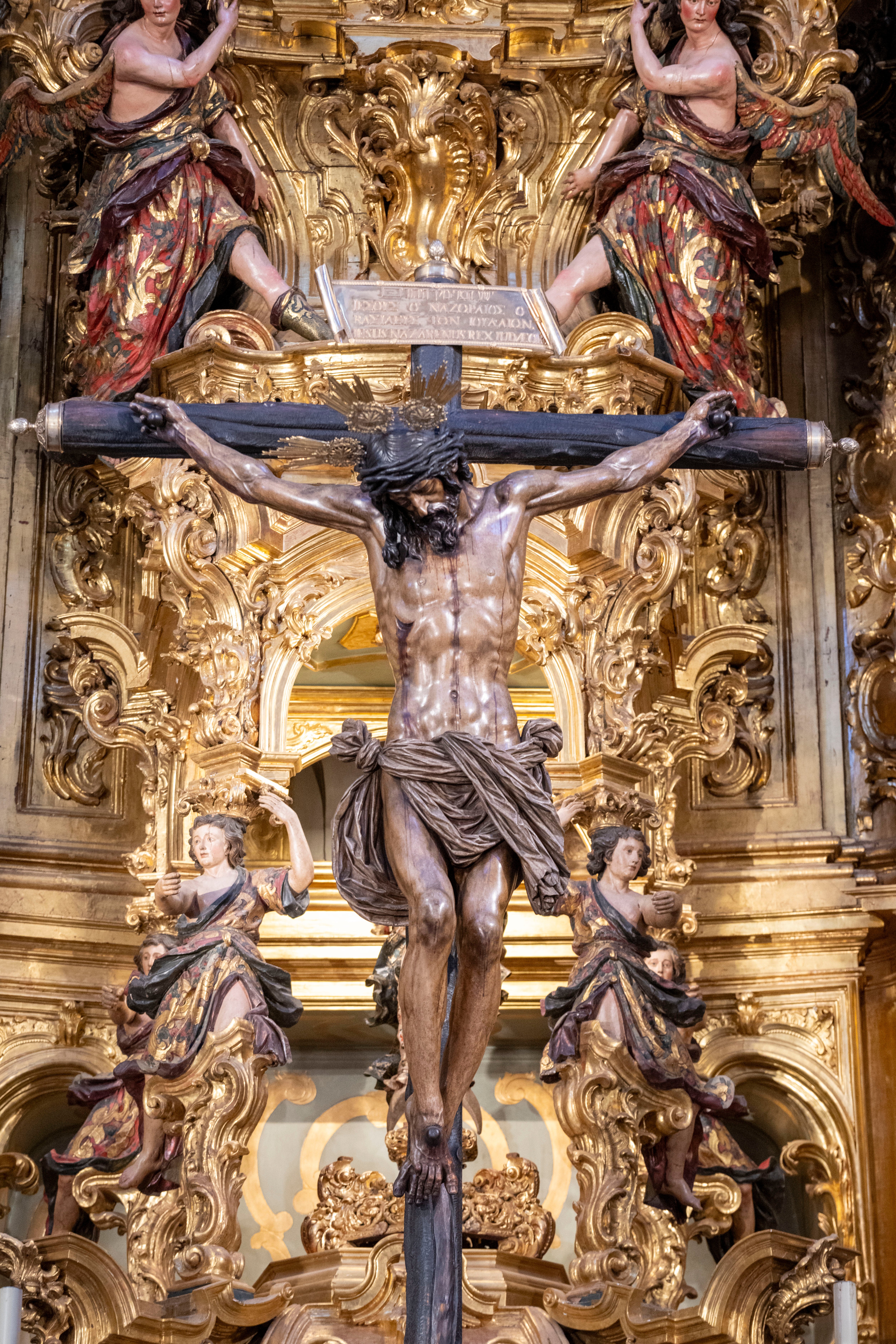 Los titulares del Amor, en el retablo mayor del Salvador