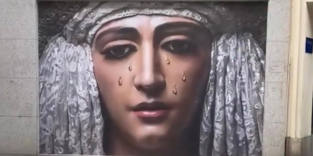 Un mural en Asunción anuncia la misión de la Esperanza de Triana: «La gente se santigua y le reza»