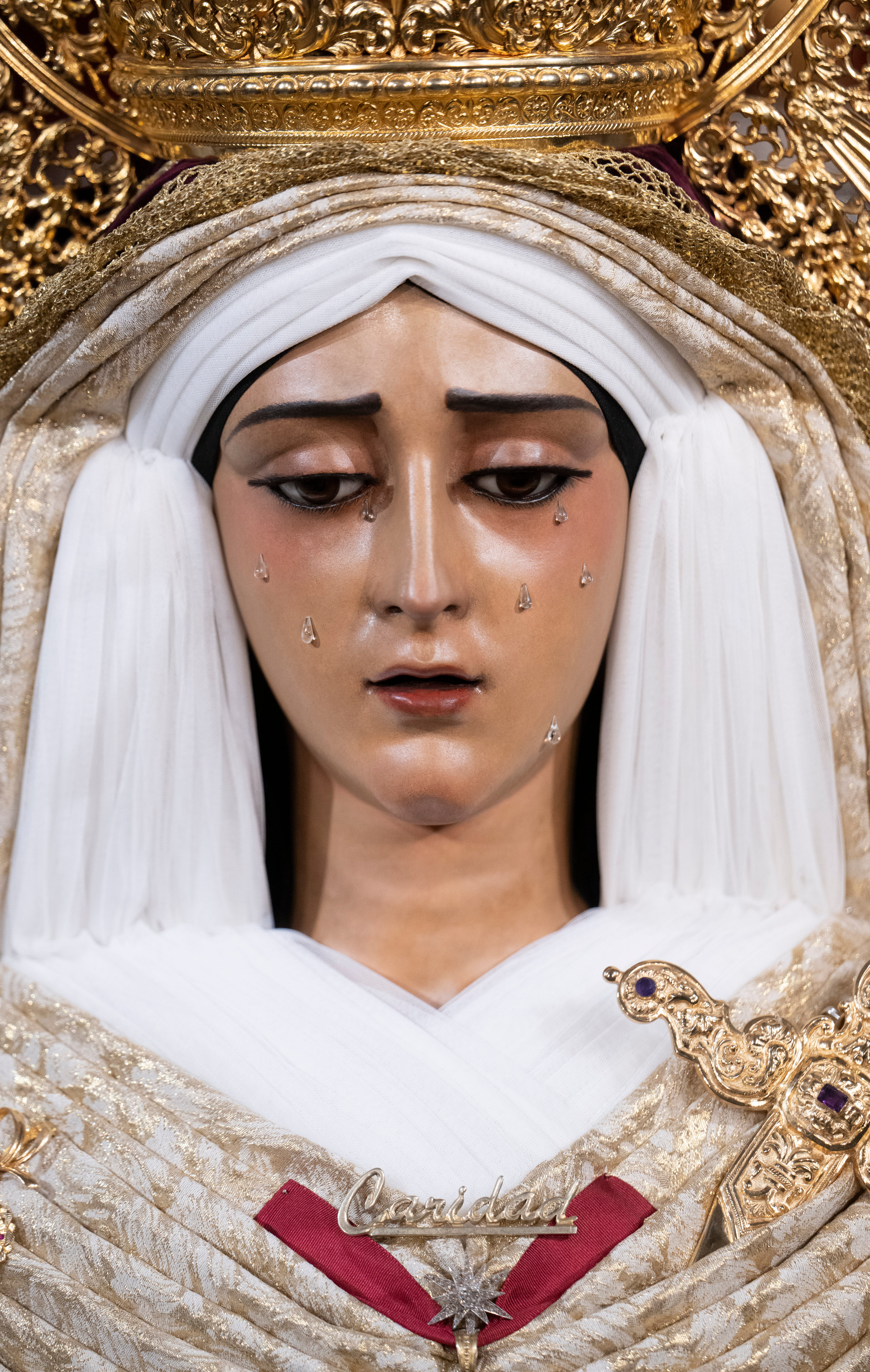 El besamanos de la Caridad del Baratillo y Presentación del Calvario, en imágenes