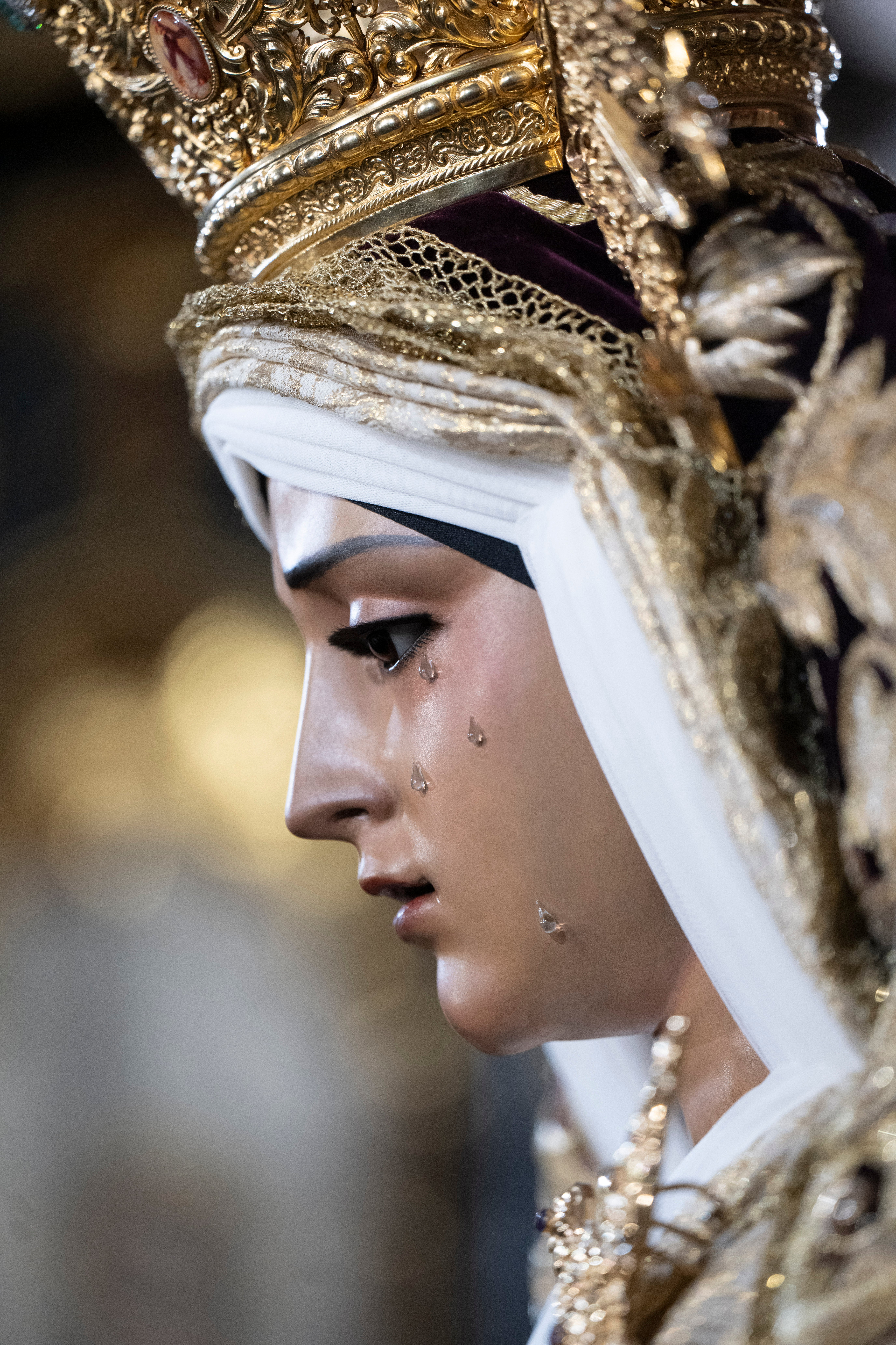 El besamanos de la Caridad del Baratillo y Presentación del Calvario, en imágenes