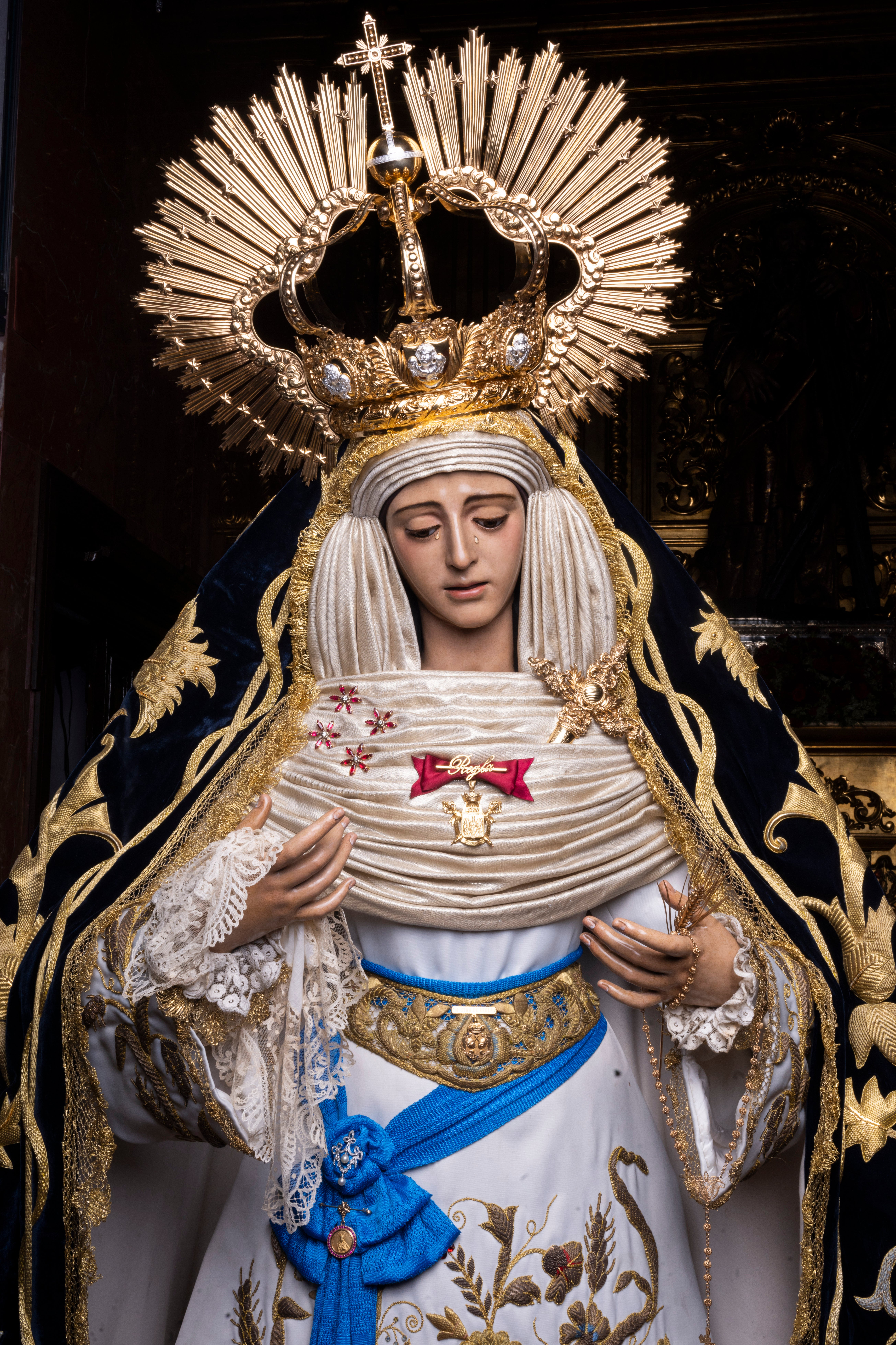 La reposición al culto de los titulares de los Panaderos, en imágenes