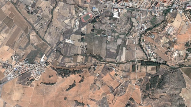 Imagen antes - Vista general del Río Magro, al sur de la localidad de Requena, después de la inundación. Se observa la crecida del cauce y los daños en las infraestructuras, principalmente en los puentes.