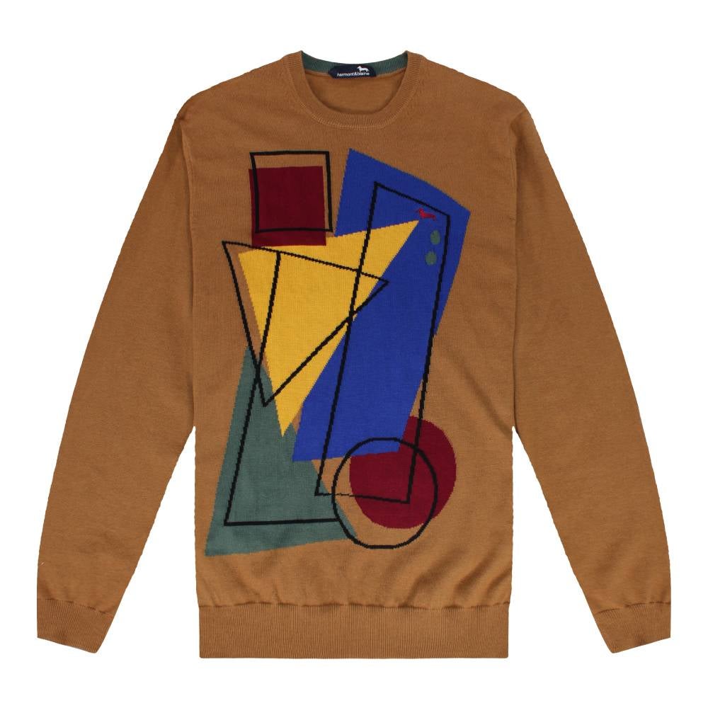 En clave arty es este jersey de mezcla de algodón y lana que combina formas geométricas de distintos colores en intarsia con el teckel de la firma Harmont & Blaine bordado sobre él. Precio: 198 euros.