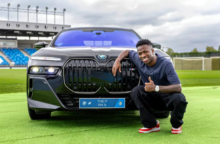 Vinicius with the official Real Madrid BMW car