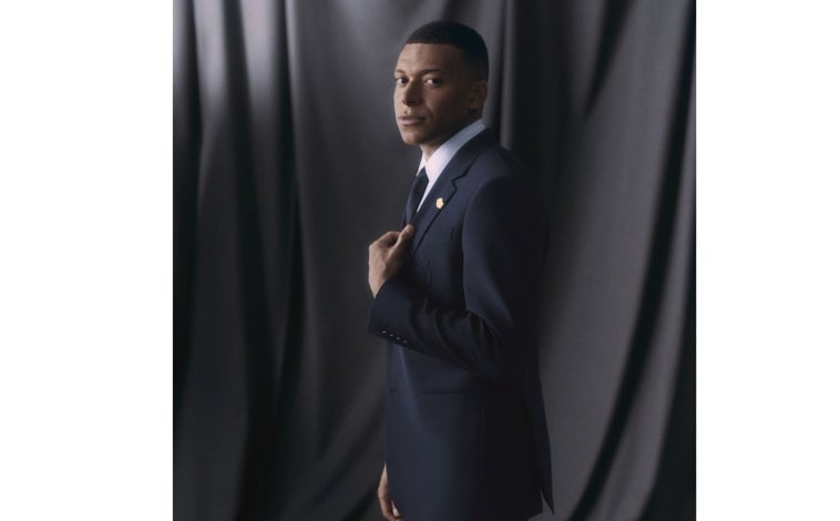 Immagine principale: Mbappé e Vinicios vestiti con Louis Vuitton