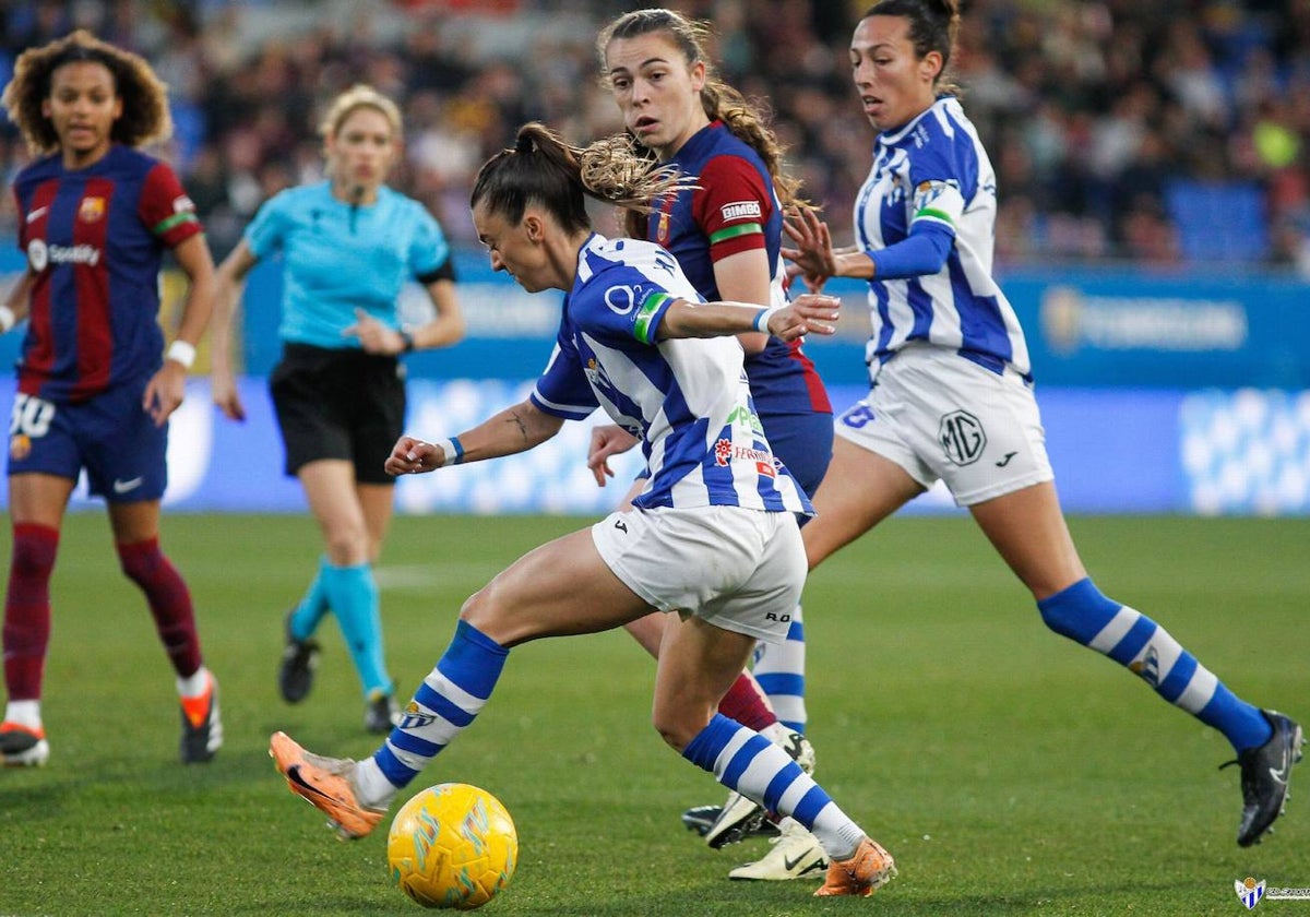 El Sporting Huelva durante la derrota que sufrió contra el Barcelona