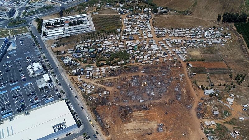 Los inmigrantes víctimas del incendio en el asentamiento de Lepe y acogidos temporalmente serán desalojados este domingo