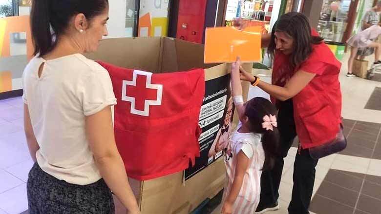 Cruz Roja muestra en la calle su trabajo social y humanitario para dar las gracias en el Día de la Banderita