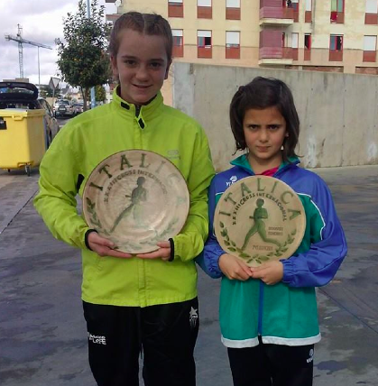 Coronas de laurel para José Manuel Cortés y María López en Itálica