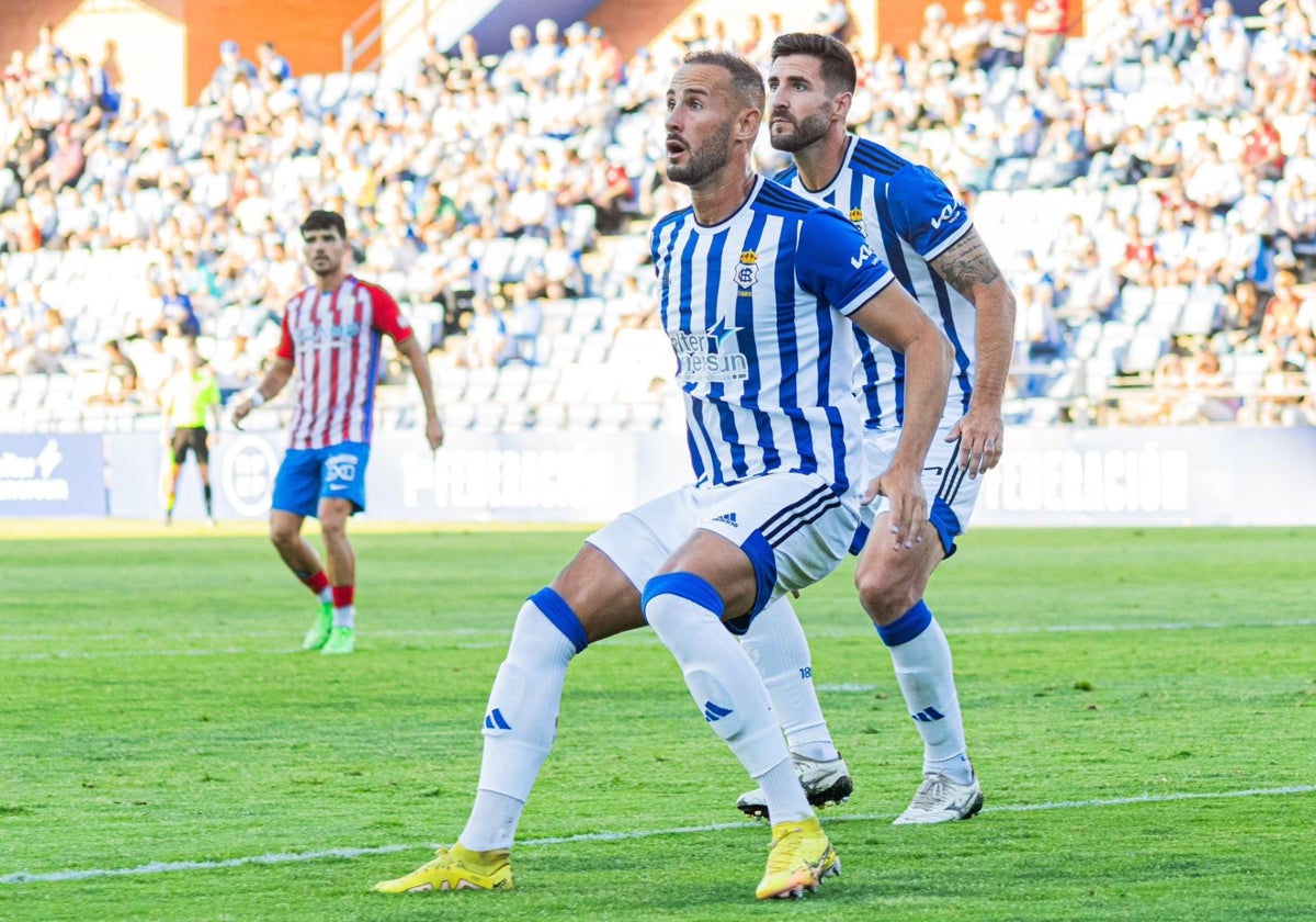 Alejandro Gálvez junto a Raúl Navas durante un partido del Decano