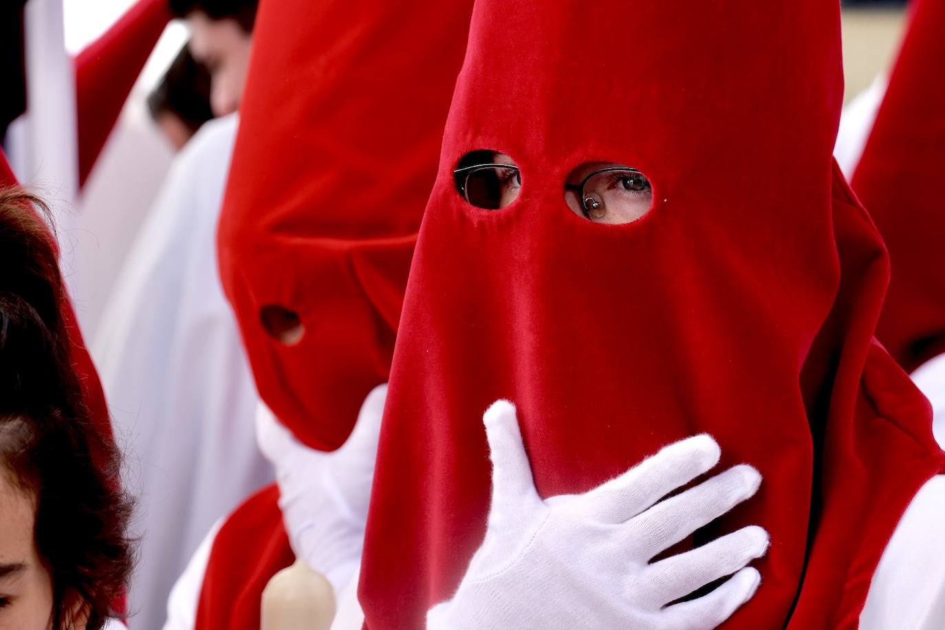 Fotos: la Borriquita ya luce en procesión en este Domingo de Ramos