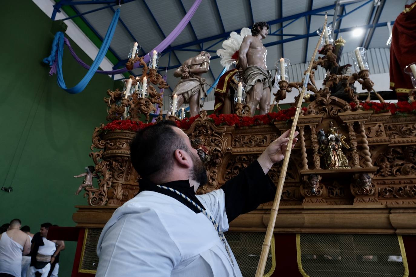 Fotos: la Borriquita ya luce en procesión en este Domingo de Ramos