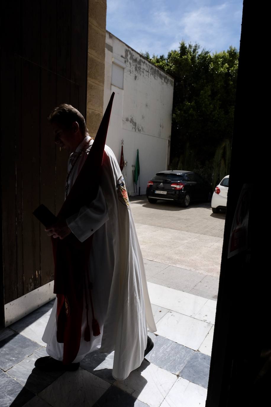 Fotos: la Borriquita ya luce en procesión en este Domingo de Ramos