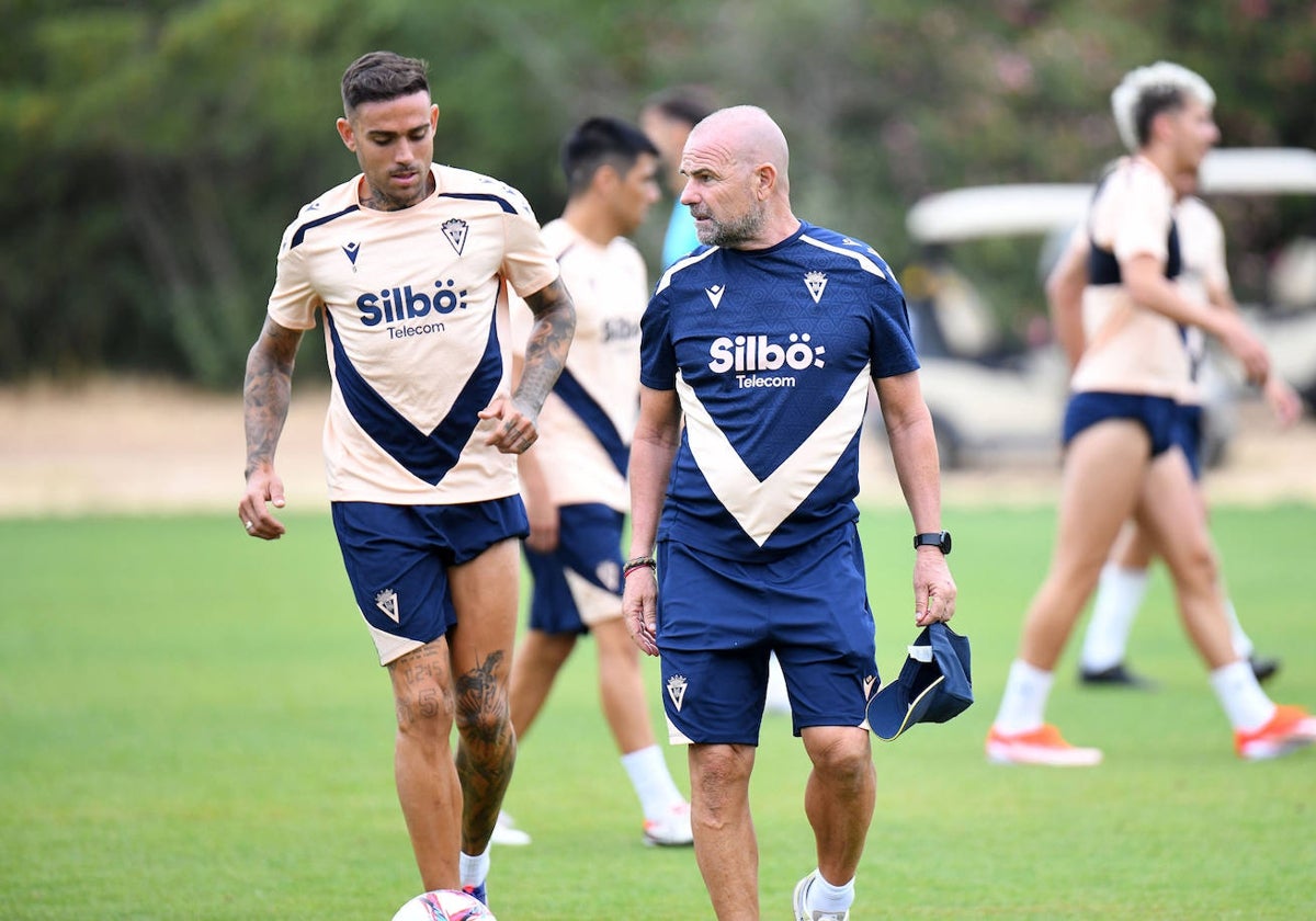 Paco López junto a Roger Martí.