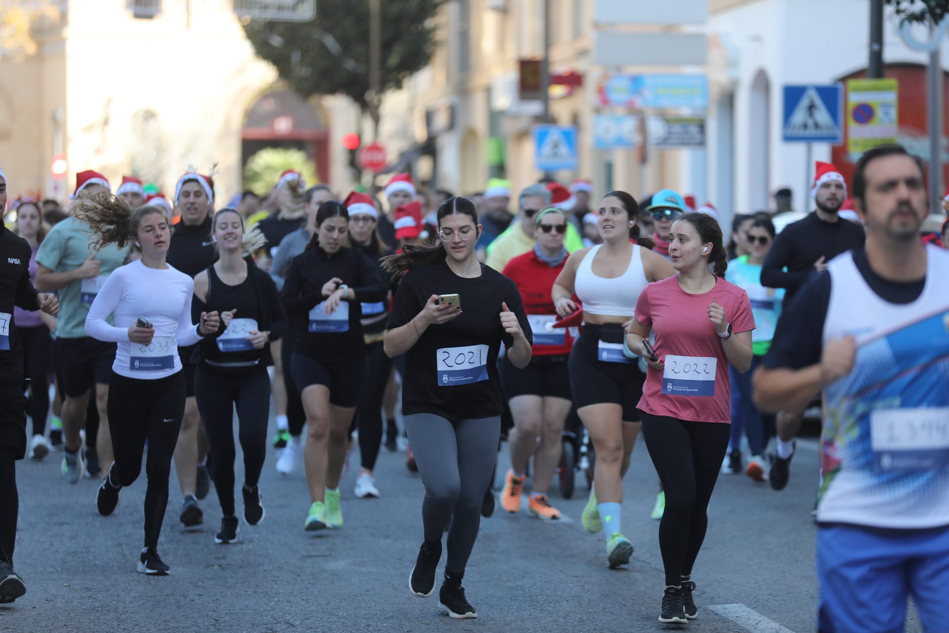 Fotos: El Puerto se entrega a su II San Silvestre