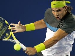 El tenista español Rafael Nadal durante una acción en el partido de hoy / AFP