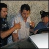 La policía italiana escolta a comisaría a Corrado Cascerino, un importante cabecilla de la mafia / AFP PHOTO