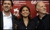 Nicolas Cage, Eva Mendes y Werner Herzog / AFP