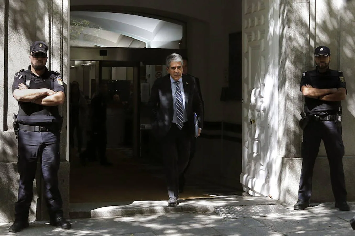 Francesc Homs, a su salida de la sede del Tribunal Supremo donde ha negado al juez del Tribunal Supremo, Andrés Palomo, haber desobedecido al Tribunal Constitucional 