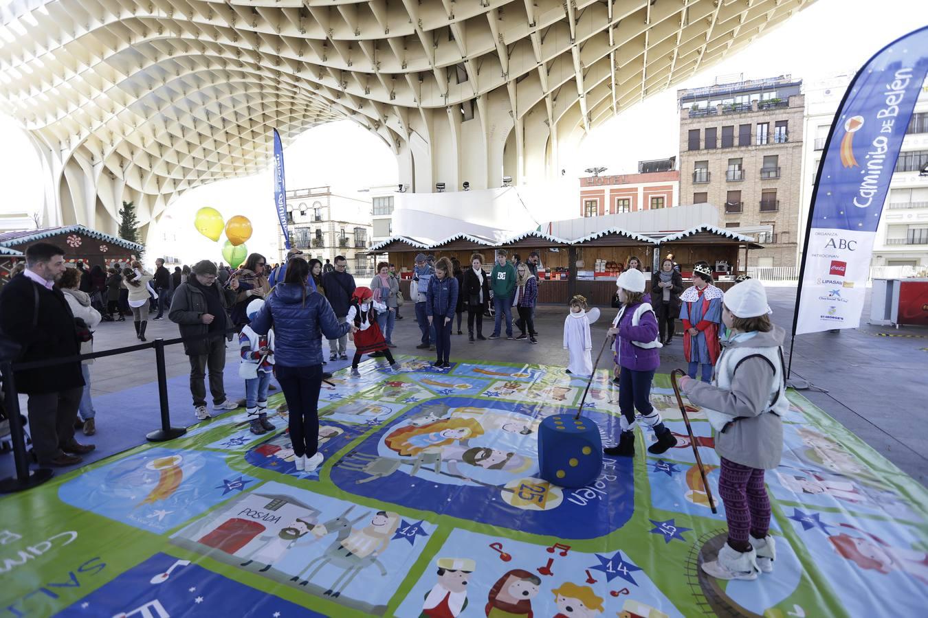 Los niños hacen el «Caminito de Belén» en Sevilla