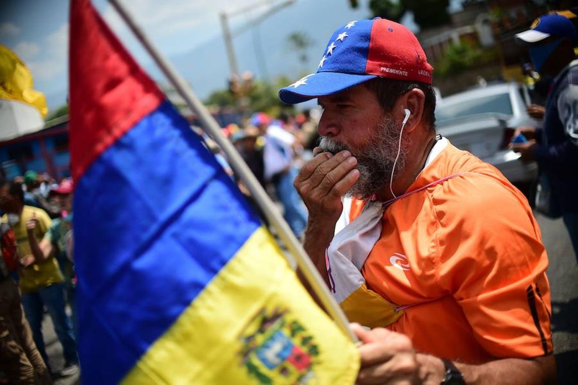 Manifestantes en Caracas contra el Gobierno de Maduro. 