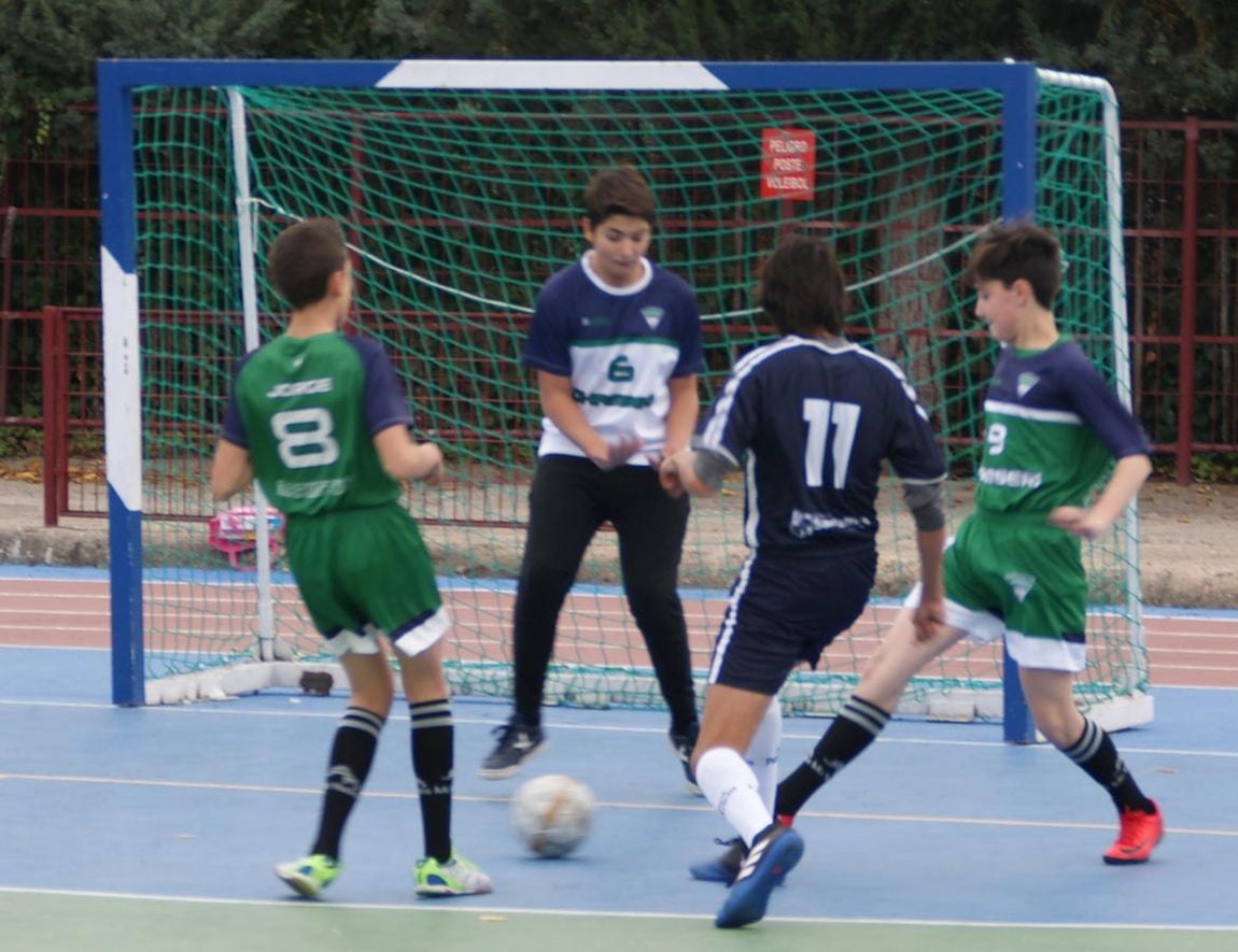 Las mejores imágenes del partido de fútbol sala cadete masculino entre San Patricio Soto Azul y Maristas Chamberí