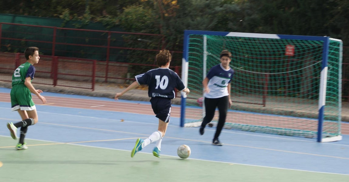 Las mejores imágenes del partido de fútbol sala cadete masculino entre San Patricio Soto Azul y Maristas Chamberí